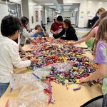 Puma Outreach - Sorting candy for troops